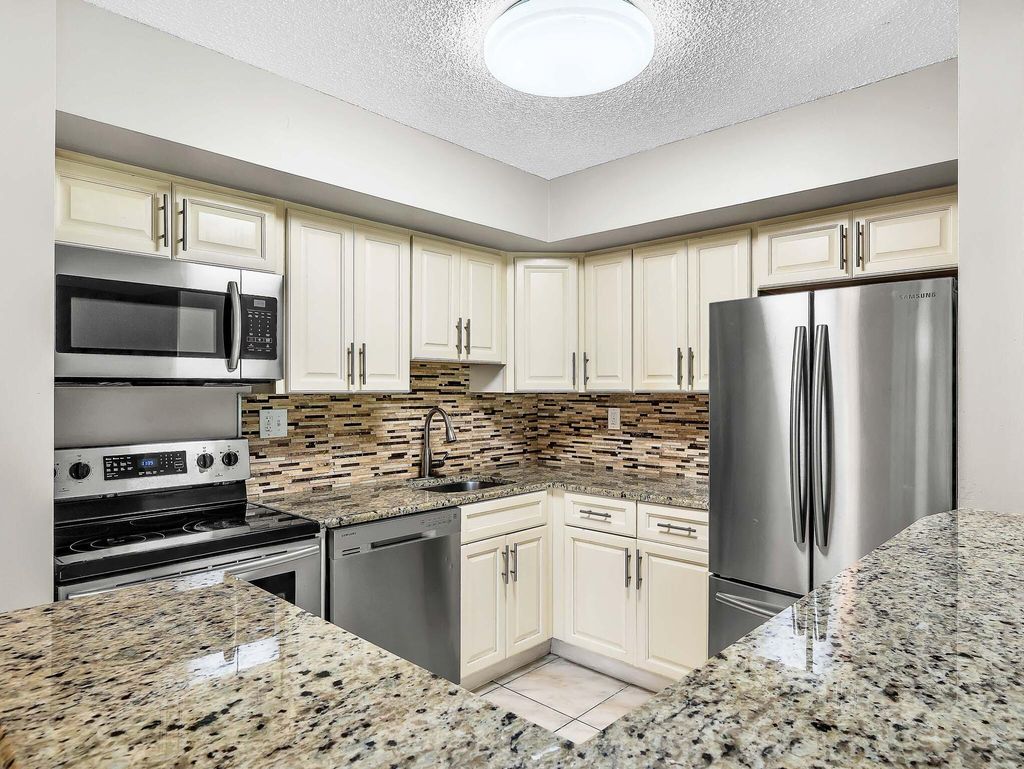 Photo of 15488 Lakes Of Delray Boulevard #108, Delray Beach, FL 33484 (MLS # R11159148)