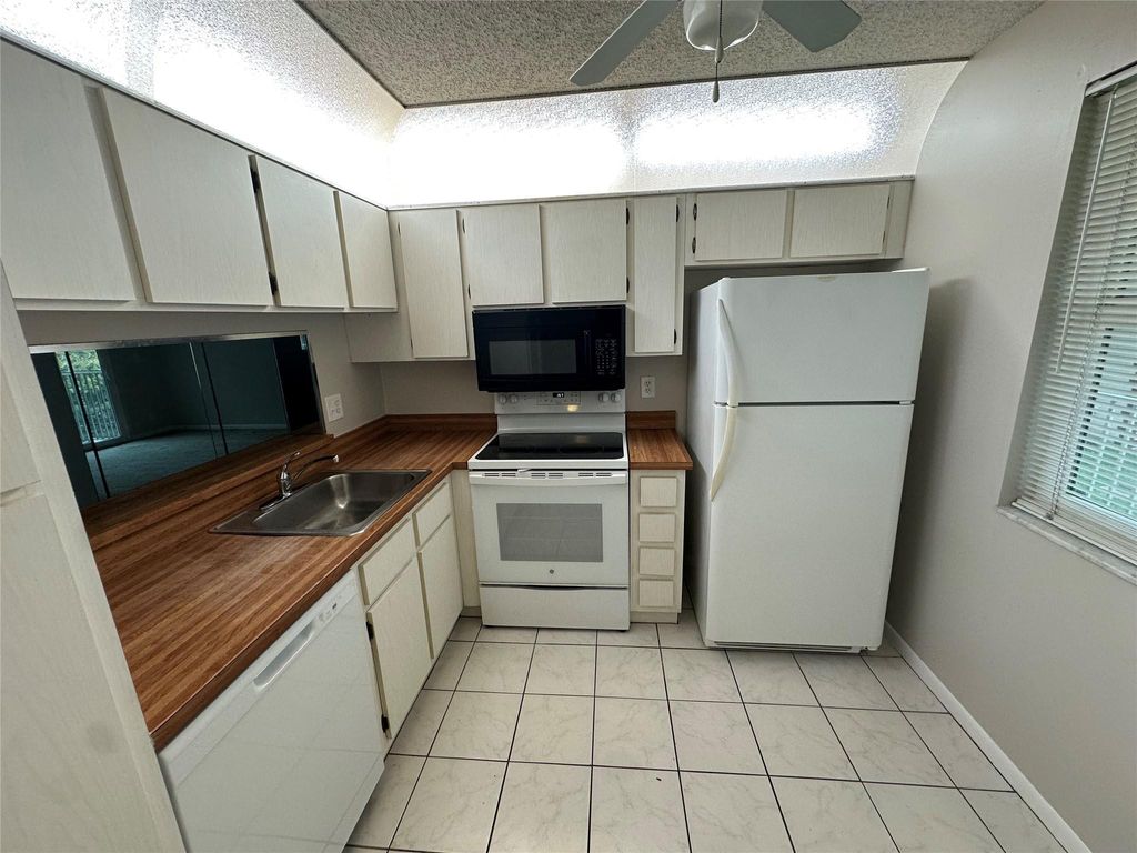 Photo of 3578 N University Drive #I-5, Coral Springs, FL 33065 (MLS # F10549027)