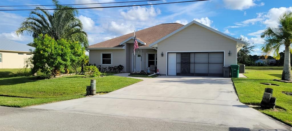 Photo of 5904 NW Favian Avenue, Port Saint Lucie, FL 34986 (MLS # R10748853)