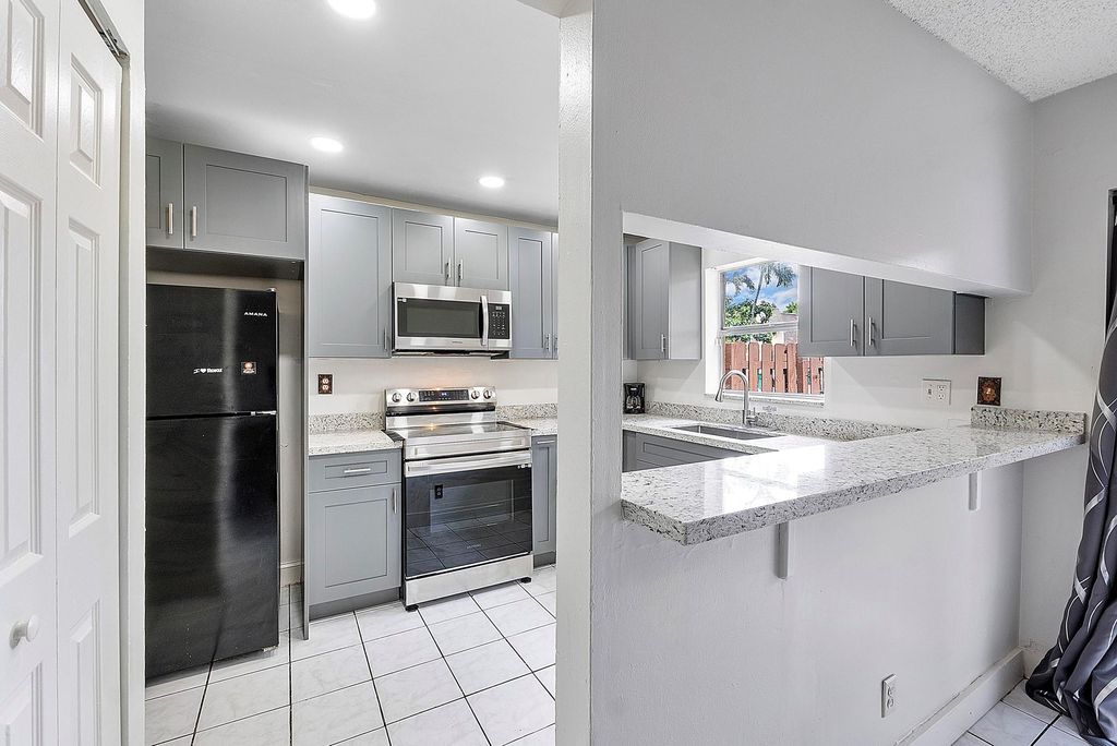 Photo of 5843 Blueberry Ct #78, Fort Lauderdale, FL 33313 (MLS # F10533736)