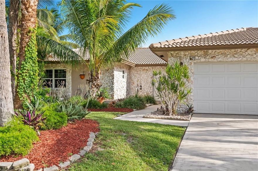 Beautiful move in ready! Single-family one-story home located in the heart of Boca Raton just 2 miles from the ocean, & Mizner Park, one of the hottest spots in town! Cozy, updated kitchen w/ white cabinets, & black granite, recess lights, lots of natural light coming through the French doors & windows. It sits in a large lot w/ a spectacular private backyard in a quiet street. Addison Mizner Elementary School just a few blocks walking. 4 bedrooms, 2 baths, new AC & Water heater, ceramic tile floors throughout the living area & wood floors in the bedrooms. Upgraded bathrooms, tempered glass windows & doors, large open roofed lanai w/ a built-in grill & bar for fun & entertainment. Expanded side yard with enough room for a pool, a playground, an RV, or a boat. No HOA fees. priced to sell.