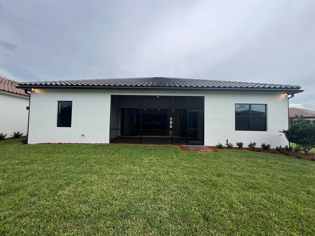 Photo of 353 SE Filoli Drive, Port Saint Lucie, FL 34984 (MLS # R11002514)