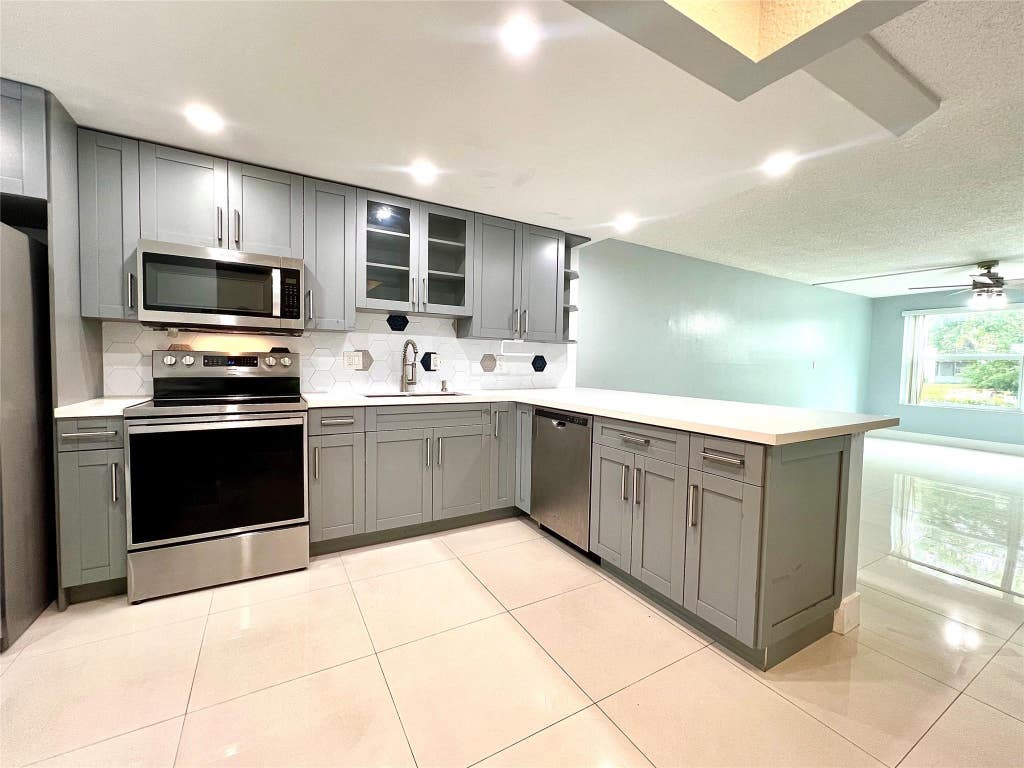 Photo of 7450 NW 17th Street #110, Plantation, FL 33313 (MLS # B26044457)