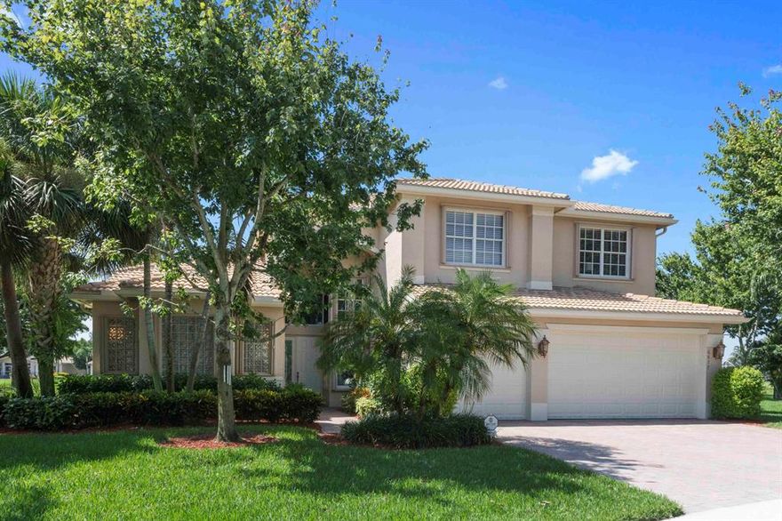 Magnificent 2-story lake front home on oversize cul-de-sac lot...near the point.  Four bedrooms plus loft; master and second bedroom/office on first floor; 2 second floor bedrooms; 4 full baths plus first floor powder room.  Soaring ceiling height in living room and family room with crown molding and large windows that afford plenty of light and lake views.  Upgraded kitchen cabinets, granite countertops, crown molding, stainless steel appliances and high hat lighting.  Extra spacious (12.3ft x 36.9ft) 2-story covered and screened rear patio with long lake views.  Mstr bdrm has large fitted closets.  3 car garage with epoxy flrs & extra 2 ft extension. Newer washer & dryer and hot water tank; accordian shutters throughout.  Cul-de-sac location is walking distance to the clubhouse. Valencia Palms amenities include:  clubhouse with lap pool & spa; resistance pool, splash pool with gazebo, 6 tennis courts, pickleball and bocce ball courts.  Active clubhouse with screened cafe area; auditions for shows.  House is painted every 4-5 years by the community.  Wall unit in family room included with the sale.
Take notice of the 2nd story ....  is a complete private area conducive to family members visiting or guest staying over. 2 bedrooms, 2 private bathrooms, a large loft.