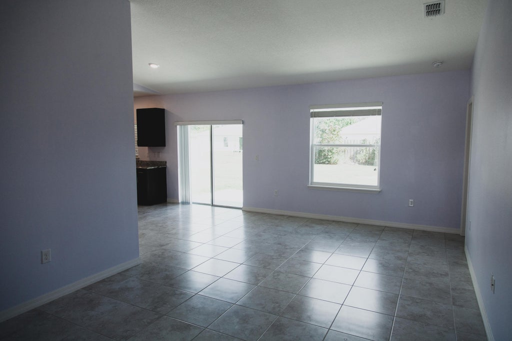 Photo of 4025 SW Kallen Street, Port Saint Lucie, FL 34953 (MLS # R10929175)