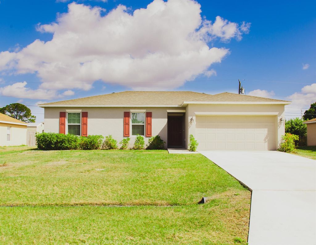 Photo of 4025 SW Kallen Street, Port Saint Lucie, FL 34953 (MLS # R10929175)