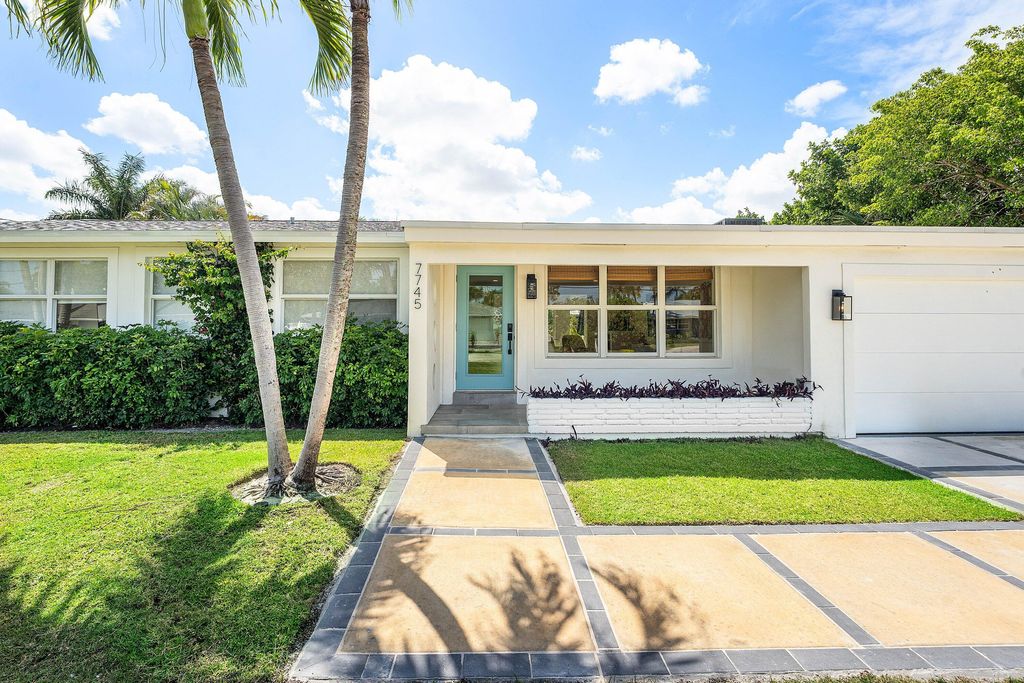 Photo of 7745 W Lake Drive, Lake Clarke Shores, FL 33406 (MLS # B26022875)