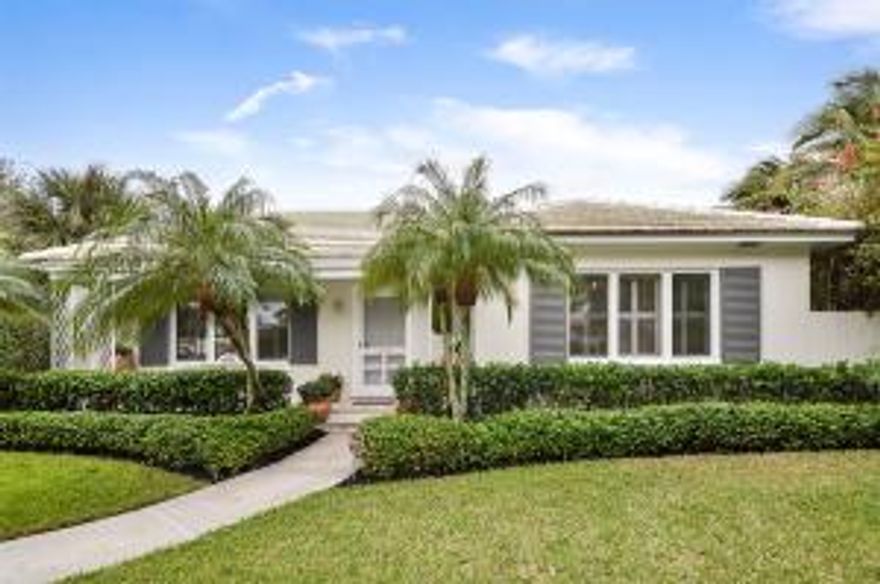 Magnificent 3 bedroom, 2.5 bath single level home with equally well designed guest cottage, pool & covered parking in the heart of El Cid on the Intracoastal block. Designer home with refined and comfortable elegance. Sunlight sparkles throughout the magnificent living spaces with generous room sizes. Perfectly manicured front lawn and covered entry opening to the stunning living room with high tray ceilings,fireplace mantel and hardwood floors which carry your vision through to the family and informal dining room with window walls viewing the exquisitely designed pool and patio area. Custom kitchen, large laundry room, den(or guest room)with French doors and attention to details are just the beginning. Unequalled master suite with stunning spa bath with ebony and mother of pearl accents!