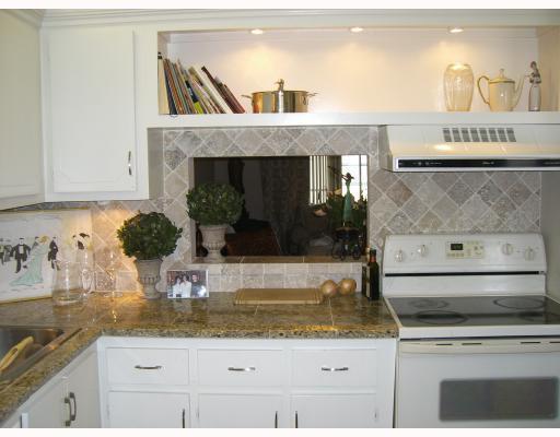 HIGHLY DESIRABLE 1ST FLOOR w/SERENE LAKE VIEWS 2/2 HOME IN AN EXCELLENT LOCATION PLEASANTLY WELCOMES ANY INVESTOR, ALL AGES & PETS* BRAND NEW PAINT, OUTLETS, NEW ELECTRICAL PANEL, ROOF* SPECIAL ASSESSMENT PAID OFF* TWO HUGE SPLIT SUITES UPGRADED A TRAVERTINE MARBLE BATHROOM, NEW VANITY, NEW W&D IN OWN UTILITY ROOM. UPDATED KITCHEN WITH GRANITE CC AND MARBLE BACK SPLASH* FLORIDA BONUS ROOM* ACCORDION HURRICANE SHUTTERS* FEW STEPS TO NEWLY RENOVATED HTD POOL, CLUBHOUSE, GYM, TENNIS, PICKLEBALL, GOLF COURSE* VERY POPULAR, FRIENDLY WELL MAINTAINED COMMUNITY IS NESTLED MINUTES TO HOTTEST DOWNTOWN ATLANTIC ''AVE'', I-95 AND THE BEACHES. DON''T MISS THIS ONE*****