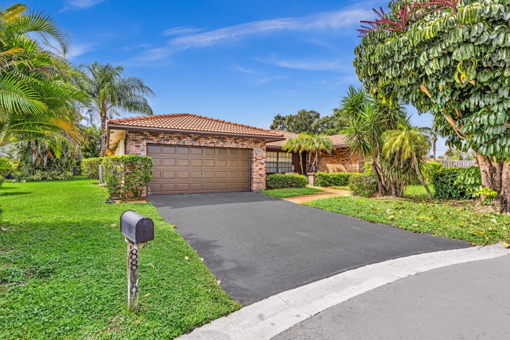 Photo of 8866 NW 2ND Place, Coral Springs, FL 33071 (MLS # B26087037)