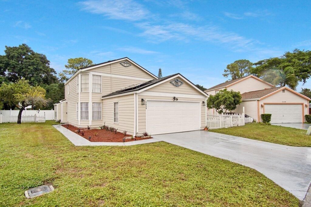Photo of 5634 Dewberry Way, West Palm Beach, FL 33415 (MLS # R11002555)