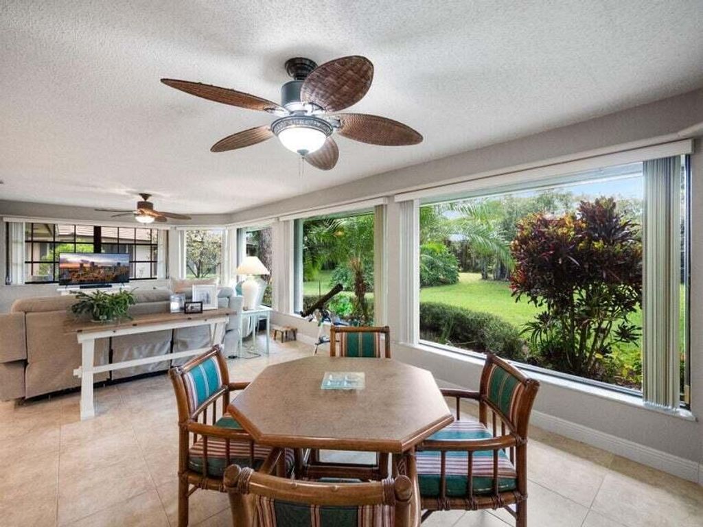 Photo of 736 Muirfield Circle, Atlantis, FL 33462 (MLS # R11055017)