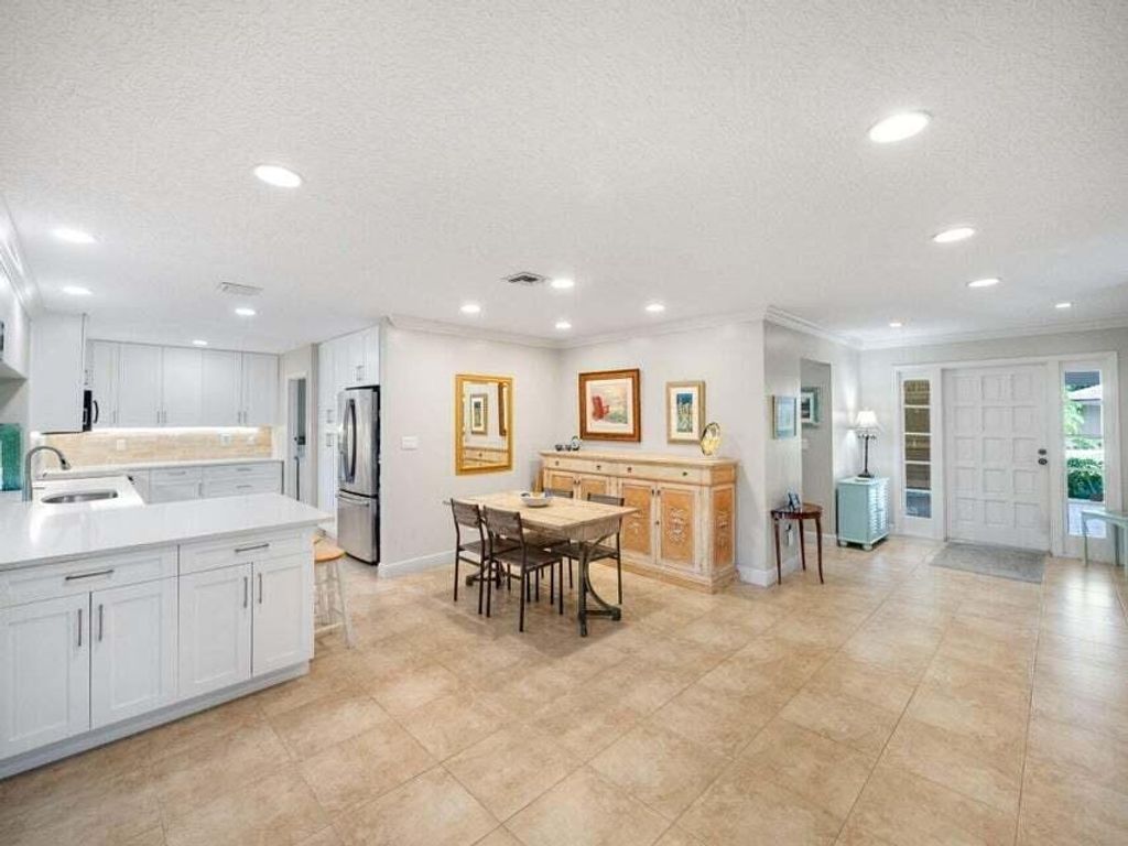 Photo of 736 Muirfield Circle, Atlantis, FL 33462 (MLS # R11055017)