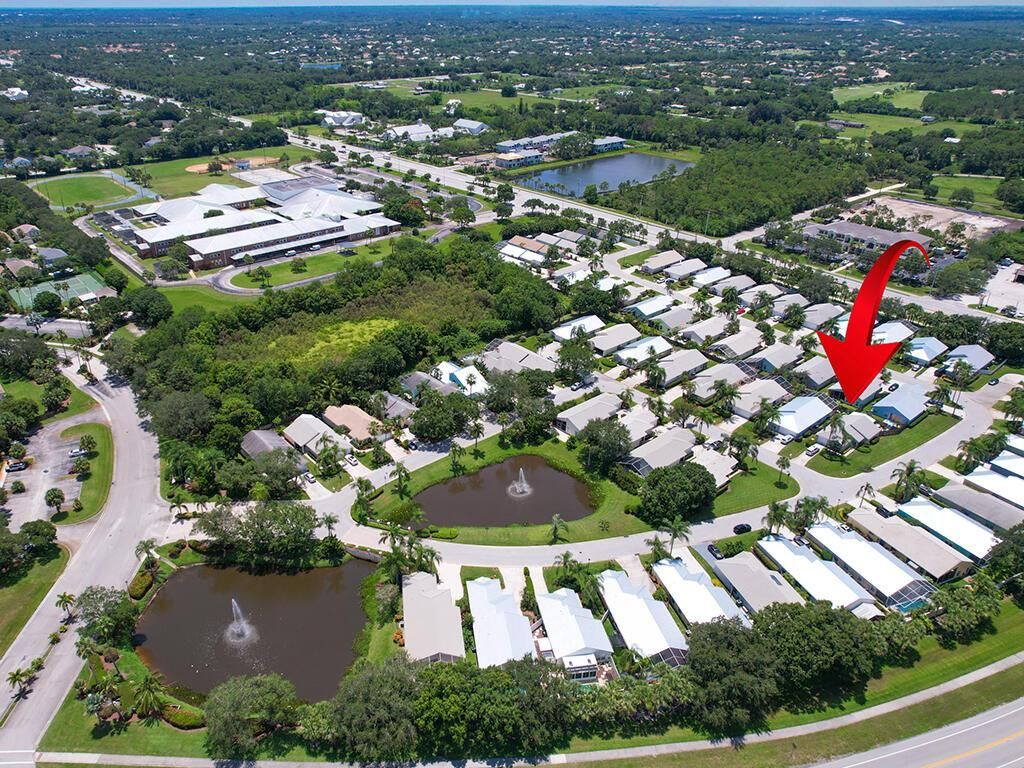 Photo of 3493 SW Pindo Palm Lane, Palm City, FL 34990 (MLS # R10999756)