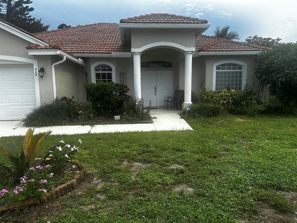 Photo of 464 SW Balfour Avenue, Port Saint Lucie, FL 34953 (MLS # R11127466)