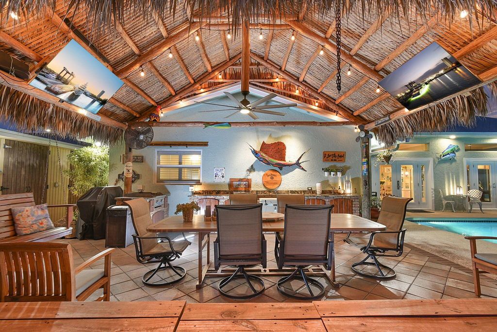 Photo of 1249 SW Seahawk Way, Palm City, FL 34990 (MLS # R10988564)