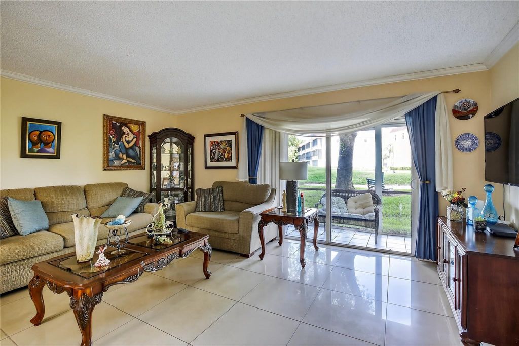 Photo of 211 S Hollybrook Drive #107, Pembroke Pines, FL 33025 (MLS # F10516874)