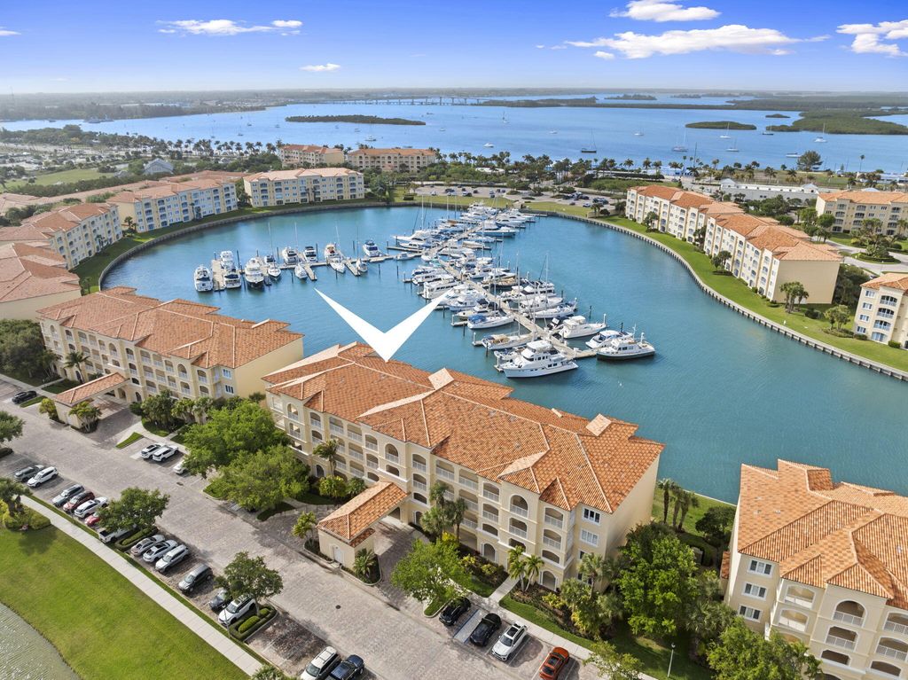 Photo of 16 W Harbour Isle Dr Dr W #303, Fort Pierce, FL 34949 (MLS # B26012051)