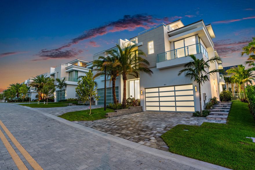 This newly completed luxury residence is on South Florida high ground, 26 feet above sea level and includes an abundance of floor-to-ceiling energy-efficient impact glass doors and windows, highlighted by expansive living areas with soaring 10' ceilings. 
The main floor great room concept overlooks the covered patio and tropical yard, complete with an outdoor kitchen with built-in grill and sparkling private pool and spa with twin sheet waterfalls for outdoor entertainment. Premium architectural grade cabinetry and wood flooring create a stunning, light-filled beach home. The added third floor option boasts a large open terrace and welcomes amazing golf course and ocean views.