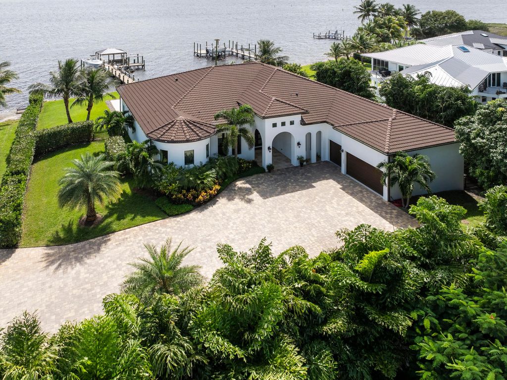 Photo of 1000 NE Wright Avenue, Jensen Beach, FL 34957 (MLS # R11140462)