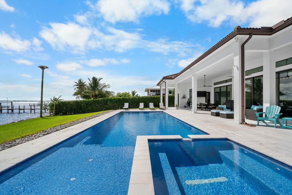 Photo of 1000 NE Wright Avenue, Jensen Beach, FL 34957 (MLS # R11140462)