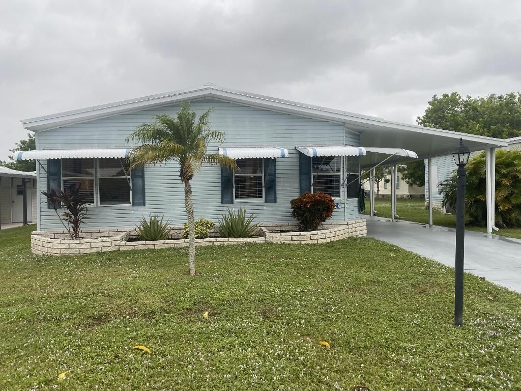 Photo of 14220 Isla Flores Avenue, Fort Pierce, FL 34951 (MLS # R10936333)
