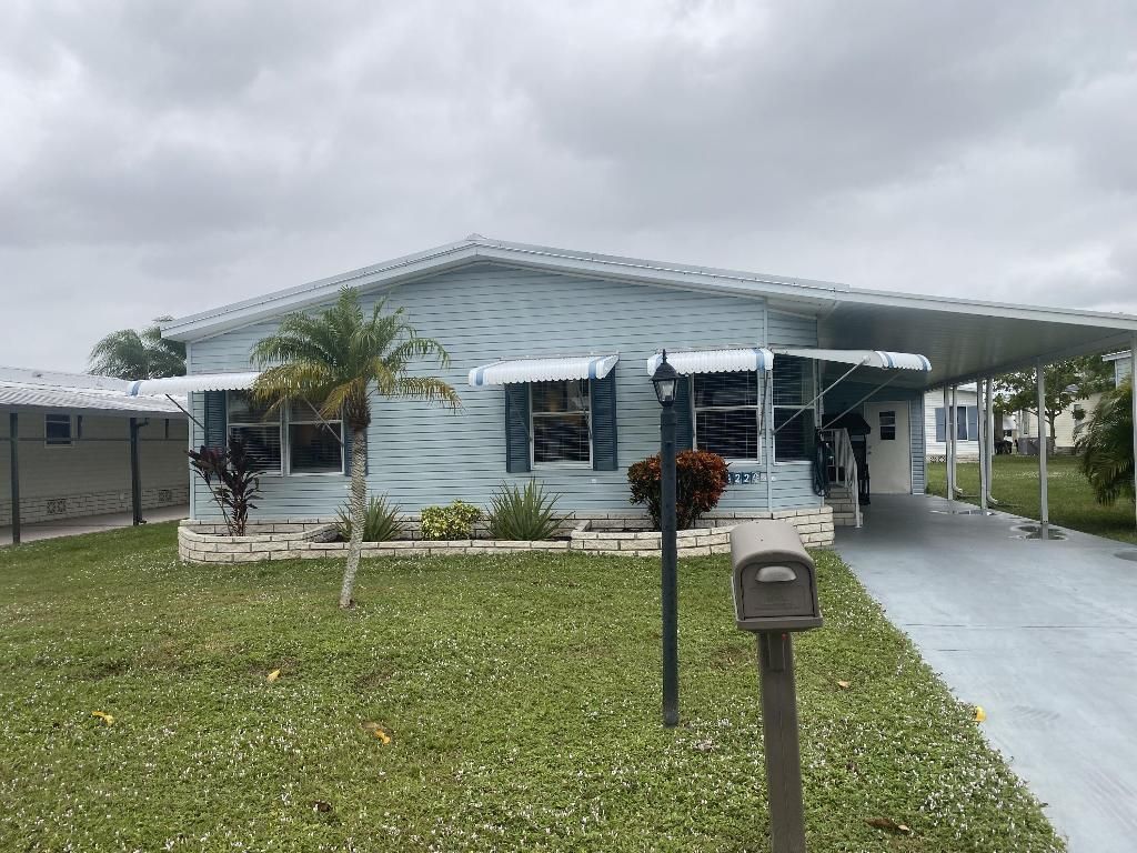 Photo of 14220 Isla Flores Avenue, Fort Pierce, FL 34951 (MLS # R10936333)