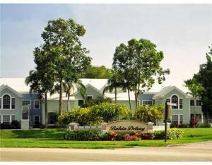 Great second floor 1/1 in gated East Delray community. Unit has been upgraded with large tile through out the living area, solid wood kitchen cabinets, granite counter tops, and stainless steel appliances. New carpet will be installed in the bedroom. Washer and dryer in the unit. Water included.