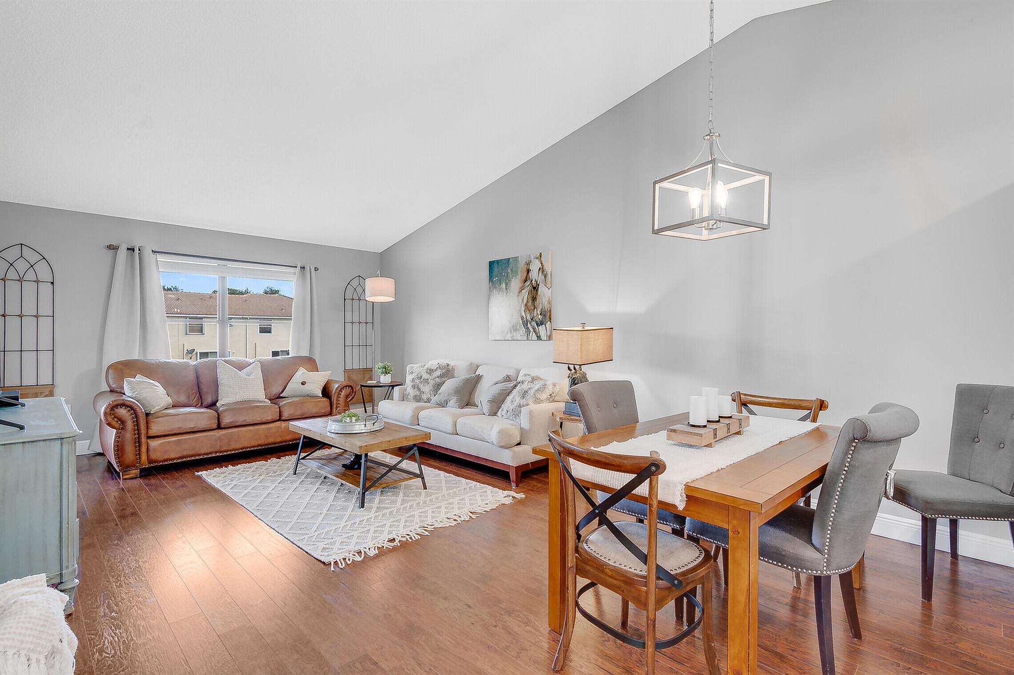 Experience the epitome of luxury in this stunning, turnkey second-floor condo featuring an expansive open-concept living space. Soaring vaulted ceilings bathe the home in natural light, creating a bright and airy ambiance. Perfectly located just minutes from WEF, Global Dressage, NPC, and the best of Wellington's world-class amenities. This exceptional seasonal rental won't last long--secure your perfect retreat today! Also available furnished Annual rental.
