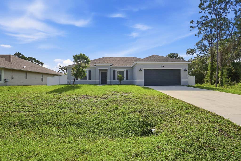Photo of 1261 SW Curry Street, Port Saint Lucie, FL 34983 (MLS # B26060099)