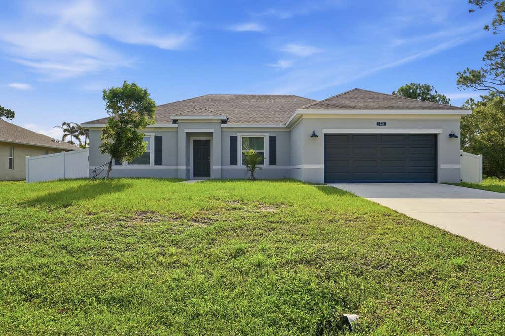 Photo of 1261 SW Curry Street, Port Saint Lucie, FL 34983 (MLS # B26060099)