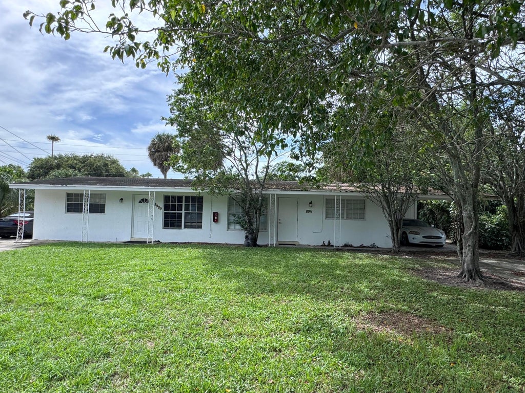 Photo of 8911 Sunset Drive, Palm Beach Gardens, FL 33410 (MLS # B26078568)