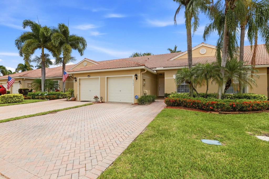 Photo of 9363 Bridgeport Drive, West Palm Beach, FL 33411 (MLS # B26040859)