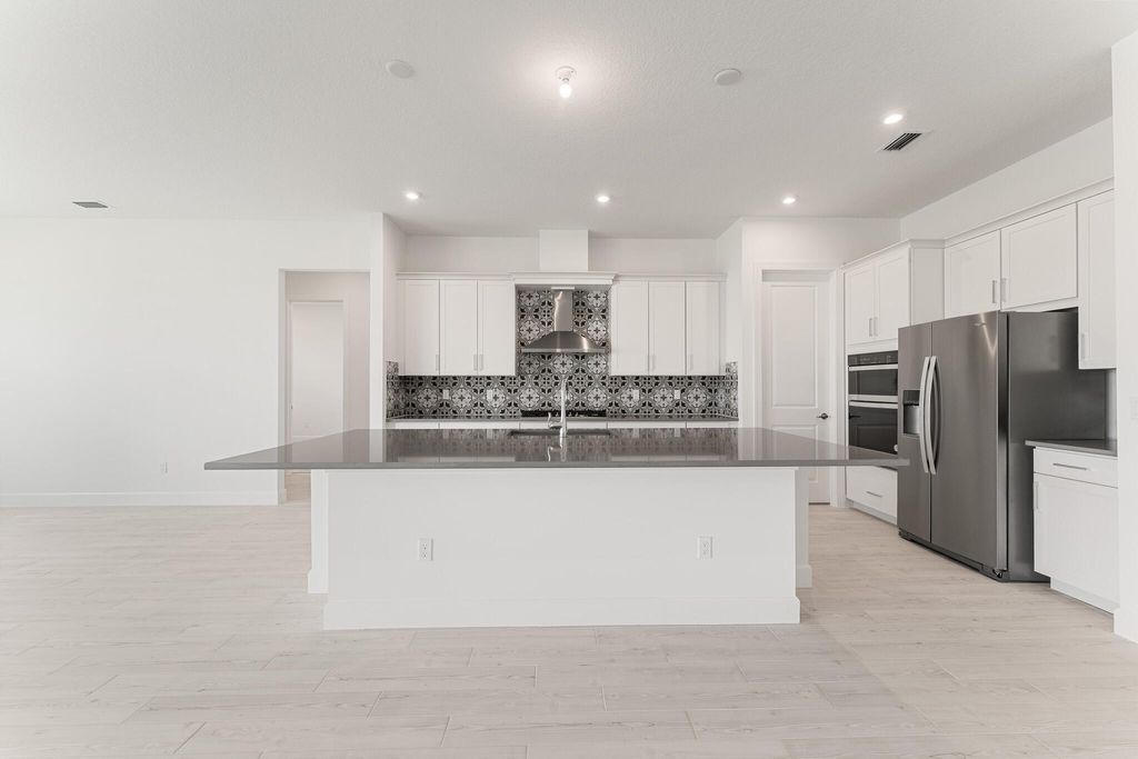 Photo of 14109 SW Delilah Way, Port Saint Lucie, FL 34987 (MLS # R11095944)