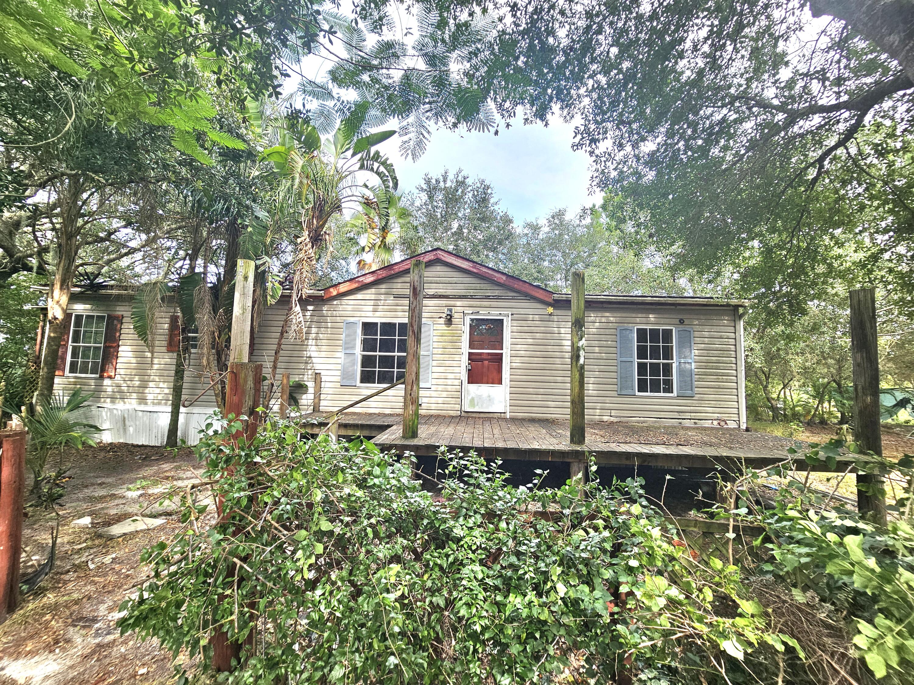 Prairie~Investors opportunity! This fixer- upper is perfect for investors or DIY enthusiasts looking to add value. Nestle on an oversized lot. This property offers country living with room to grow, play or build. NO HOA restrictions give you the freedom to customize your vision. Located in a growing quiet area yet just a short commute to town, shopping and schools. School bus pick up is available, making it convenient for families. With plenty of nearby outdoor activities like hiking, fishing and mudding. Bring your tools and Imagination-Potential awaits! Measurement are approx.