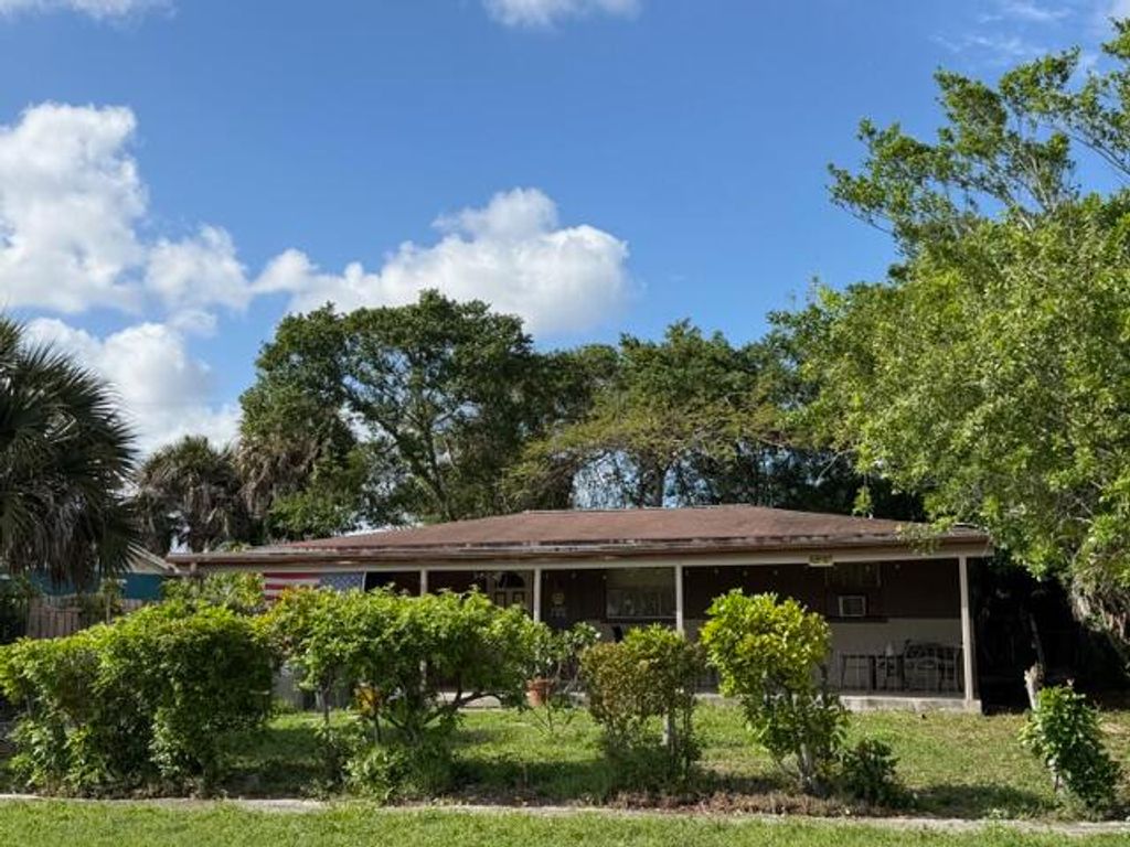 Photo of 5107 Marcia Place, West Palm Beach, FL 33407 (MLS # B26015665)
