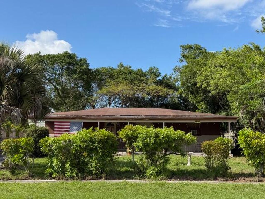 Photo of 5107 Marcia Place, West Palm Beach, FL 33407 (MLS # B26015665)