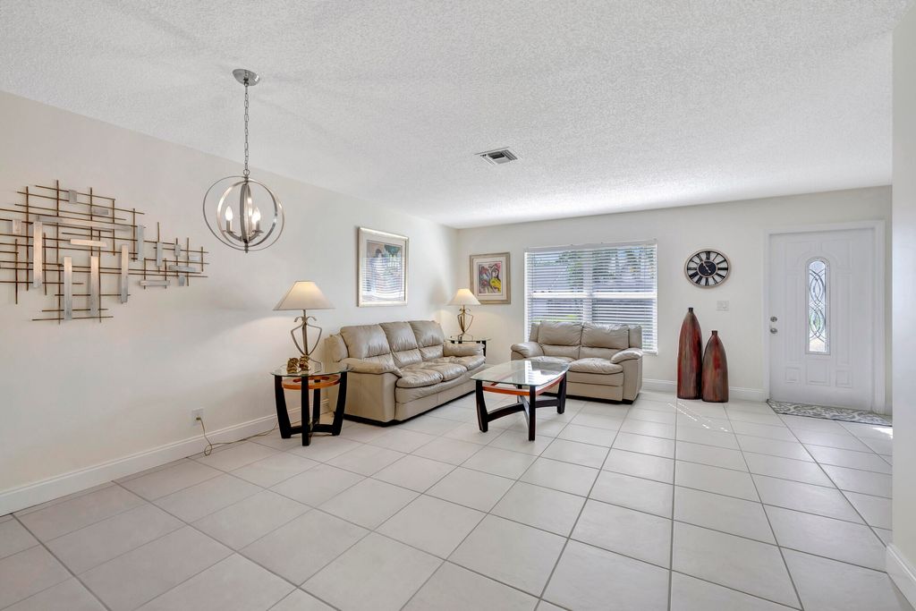 Photo of 5451 Chicory Lane, Lake Worth, FL 33463 (MLS # R10941615)