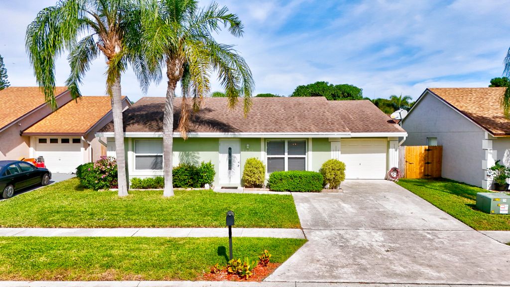 Photo of 5451 Chicory Lane, Lake Worth, FL 33463 (MLS # R10941615)