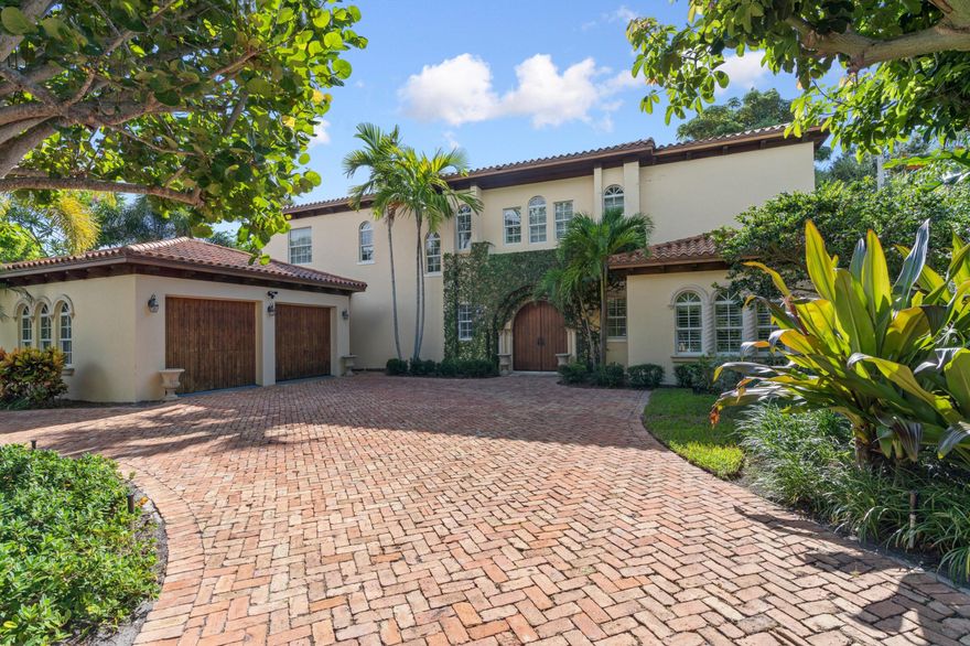 Located one block from the Intracoastal in the historic El Cid neighborhood of West Palm Beach, this 5,996 SF 6-bedroom, 5.5-bathroom Mediterranean-style home is a classic silhouette with a modern feel. Enter through the foyer on the first floor into the gallery, which connects the living, dining, kitchen and family rooms with two bedrooms with en-suite bathrooms. Volume ceilings mirror marble floors, with plenty of natural light and dark wooden accents throughout. On the second floor, the sitting room connects to the lavish master suite with a master bath, master closet, and a private veranda, with two additional bedrooms with en-suite bathrooms. With updated appliances, a 2-car detached garage, heated pool, hot tub, lanai, and outdoor fireplace, this house is an all-in-one paradise.
