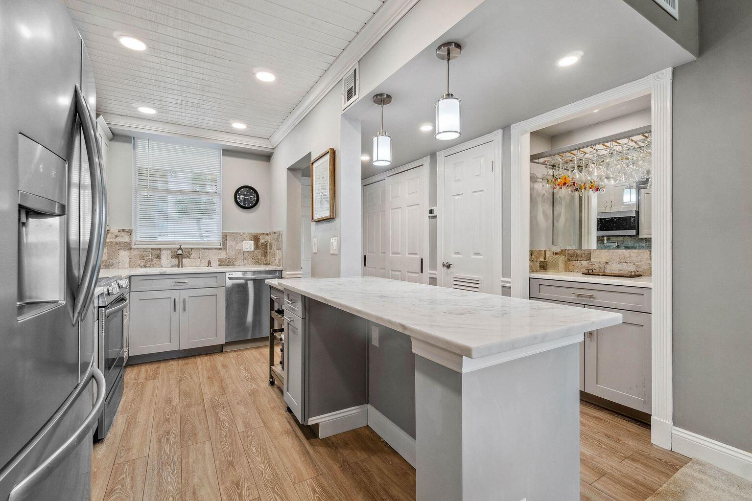 This 1 bedroom 1 bath condo has been totally remodeled. The kitchen features wood shaker style cabinets, stainless steel appliances, and quartz countertops. Enjoy the views of the ICW and the Earman River from your bedroom and living area. Relax on your balcony and watch the boats pass by. This community amenities include a pool with beautiful views of the ICW, community room, exercise room, billiard room and party room. A tenant is in place on a 1 year lease. Great Investment for waterfront property.