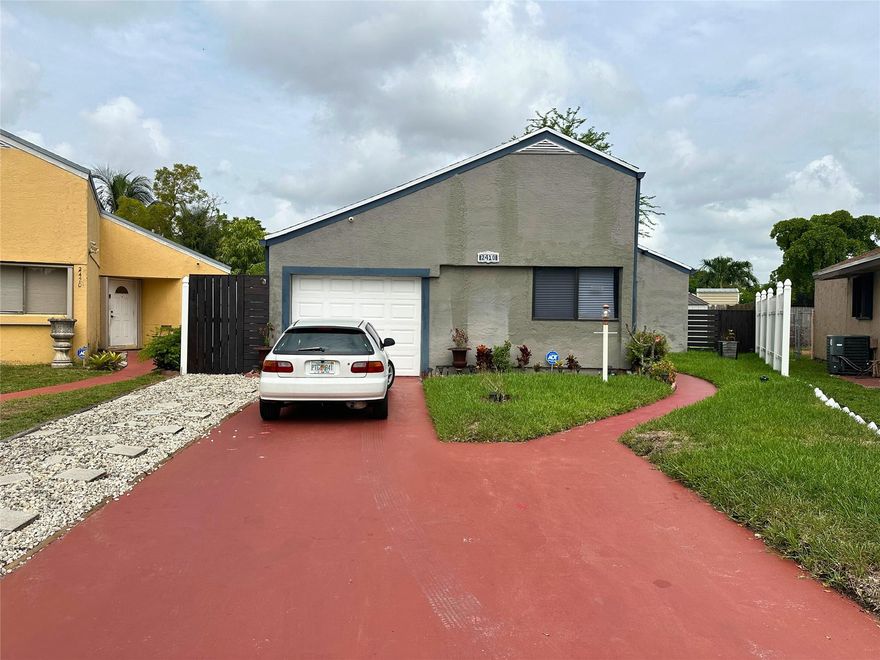 A spacious 2-bedroom and 2-bathroom home with a newer kitchen with stainless steel appliances. One bedroom has carpet, with tile flooring in the rest of the home. Includes a washer, dryer, and a huge fenced backyard. There is no garage.