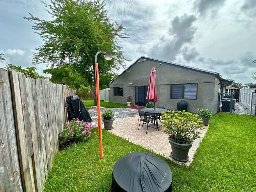 A spacious 2-bedroom and 2-bathroom home with a newer kitchen with stainless steel appliances. One bedroom has carpet, with tile flooring in the rest of the home. Includes a washer, dryer, and a huge fenced backyard. There is no garage.