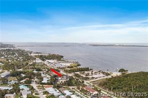 Discover a Superb Opportunity to live in Jensen Beach! The Iconic River Vista sits directly across the street from The Intracoastal Waterway, Indian Riverside Park & the US Sailing Center. Enjoy the Premium North East Corner location with warm/cool Easterly breezes. This light & bright 55+ apartment home with Elevator access is Xtra large and offers over 1100 sqft. of living area with split bedroom suites PLUS a cozy screened Florida room +PLUS your own private ''stoop'' outside the 2 front doors. Freshly painted, Newer Flooring & with Newer window Coverings. River Vista offers a swimming pool, community laundry, personal storage area(7'x4') & 1 covered carport per Unit. Fully included in your lease is Water, Sewer, Trash, Landscaping & exterior Building insurance.
