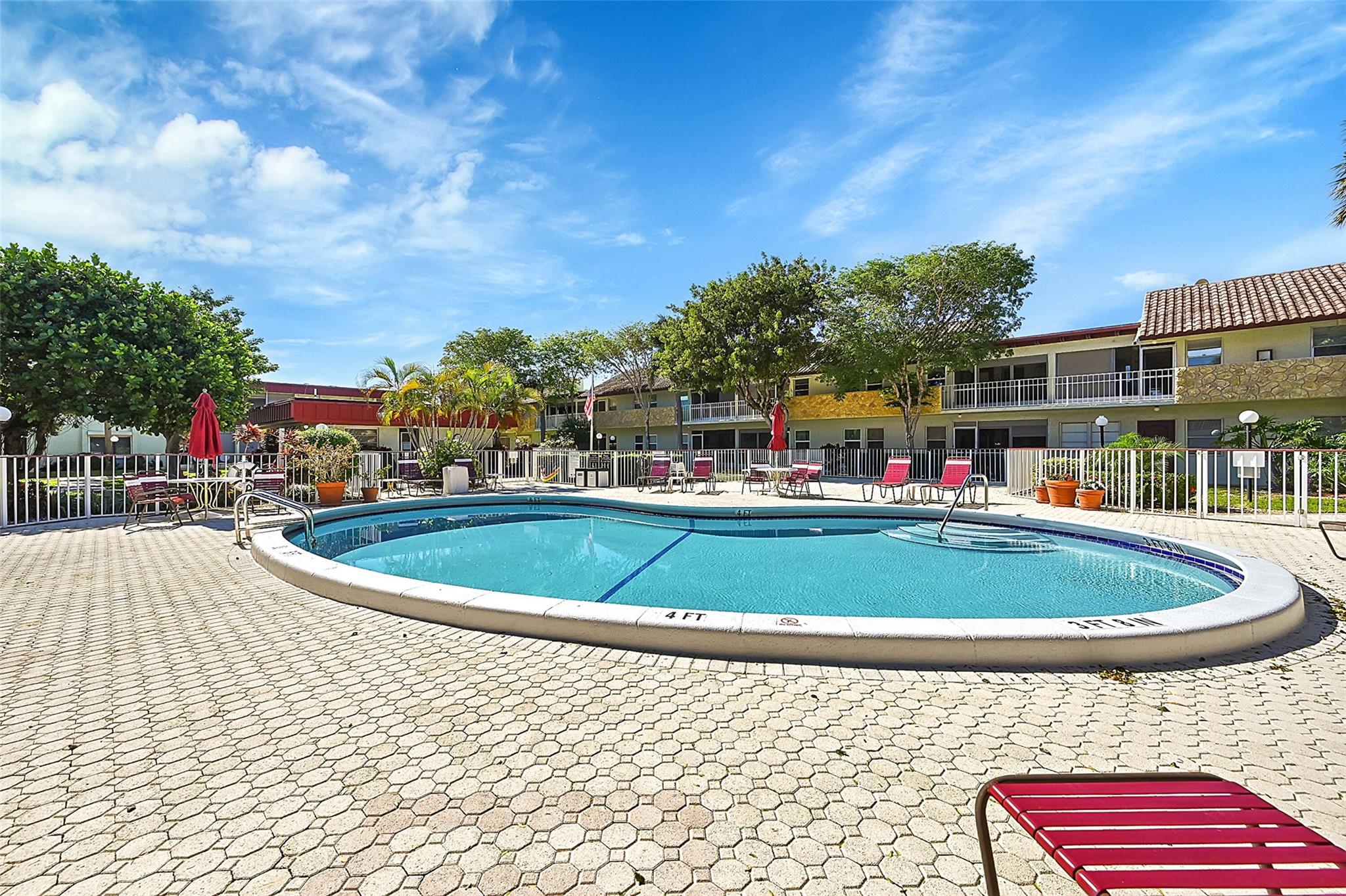 2-BED, 2-BATH CONDO IN EAST DEERFIELD BEACH. THIS CONDO OFFERS BOTH COMFORT AND CONVENIENCE IN ONE OF THE BEST LOCATIONS. JUST STEPS AWAY FROM A LARGE UPDATED HEATED POOL. THE BACK PATIO IS YOUR PRIVATE OASIS. INSIDE, ENJOY CLEAN, MOVE-IN-READY SPACES WITH TILE FLOORS THROUGHOUT. THE SPLIT FLOOR PLAN OFFERS PRIVACY, WITH ENSUITE BATHROOMS IN EACH BEDROOM. PLUS, YOU'LL LOVE THE IN-UNIT WASHER AND DRYER, MAKING LAUNDRY DAY A BREEZE. ADD’L FEATURES INCLUDE HURRICANE SHUTTERS, A NEW ROOF, AND ASSIGNED PARKING WITH PLENTY OF GUEST SPOTS. THERE'S ALSO A SECURE, LOCKED STORAGE AREA FOR YOUR CONVENIENCE. PET LOVERS WILL BE HAPPY TO KNOW THAT THE COMMUNITY IS PET-FRIENDLY, ALLOWING 2 SMALL PETS (UP TO 20 LBS). WALKING DISTANCE TO SHOPPING, DINING, AND THE BEAUTIFUL BEACHES OF DEERFIELD. NO RENTALS.