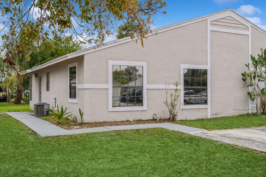 Photo of 5791 SE Collins Ave, Stuart, FL 34997 (MLS # R11052382)