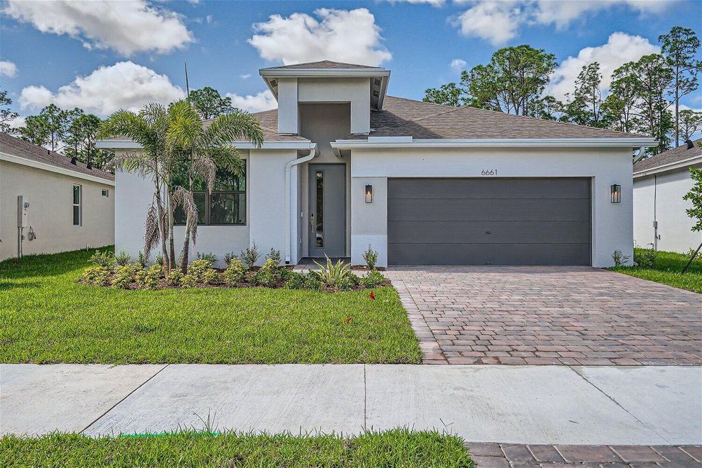 Photo of 6661 SE Park Trace Drive, Stuart, FL 34997 (MLS # R10980525)