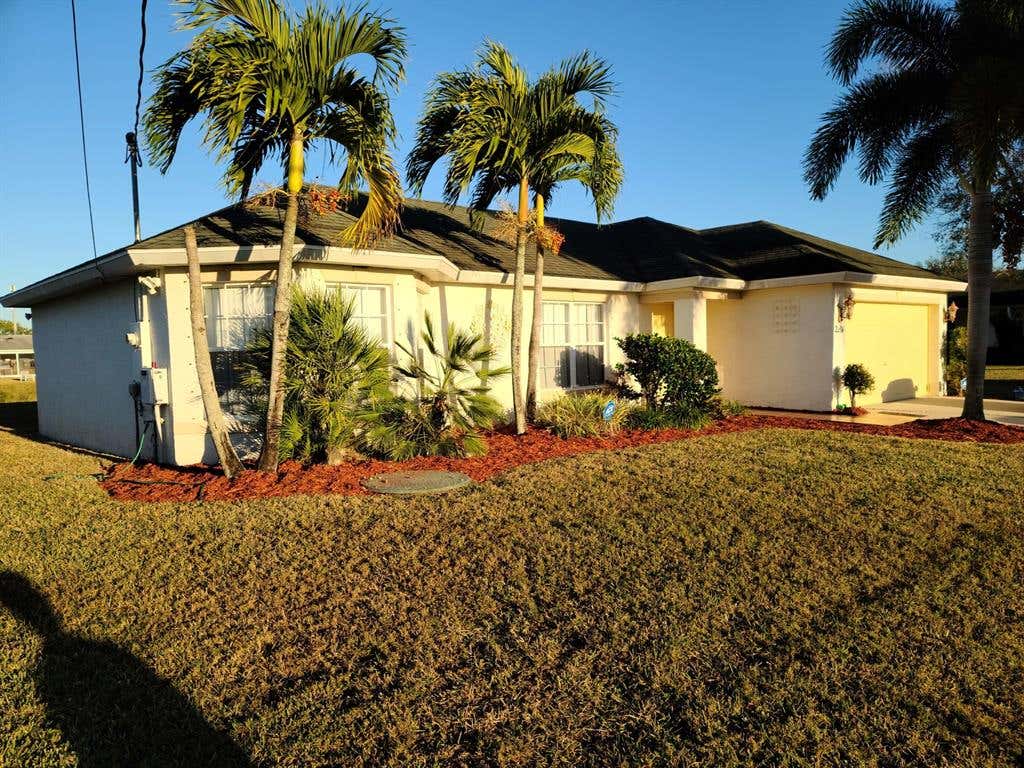 Photo of 2201 SW Chestnut Lane, Port Saint Lucie, FL 34953 (MLS # R10686844)