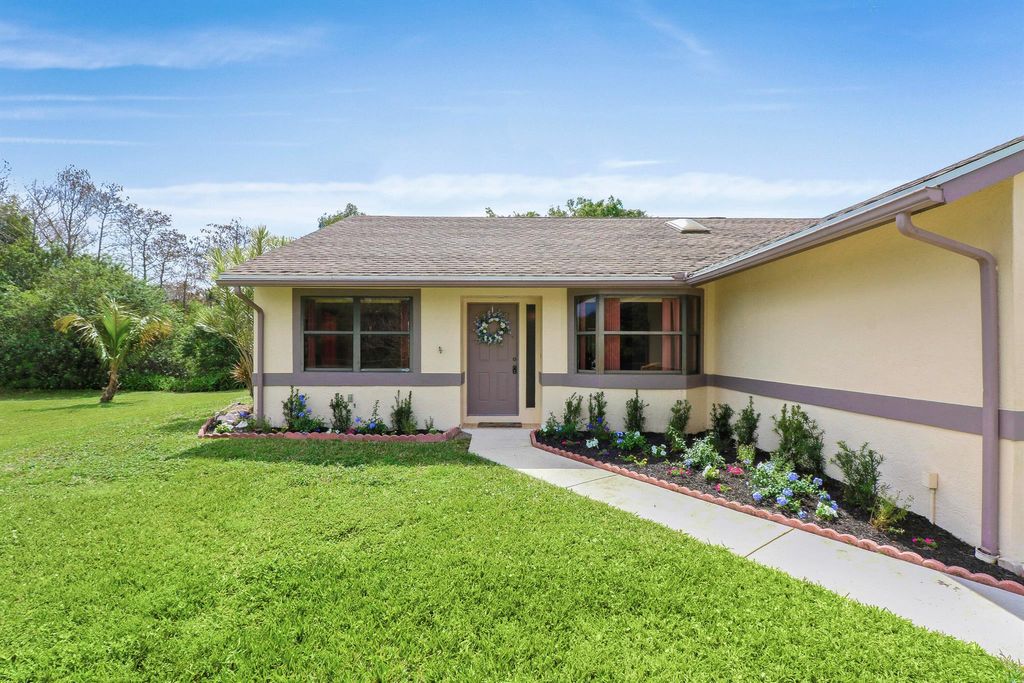 Photo of 7662 165th Street N, Palm Beach Gardens, FL 33418 (MLS # R10968471)