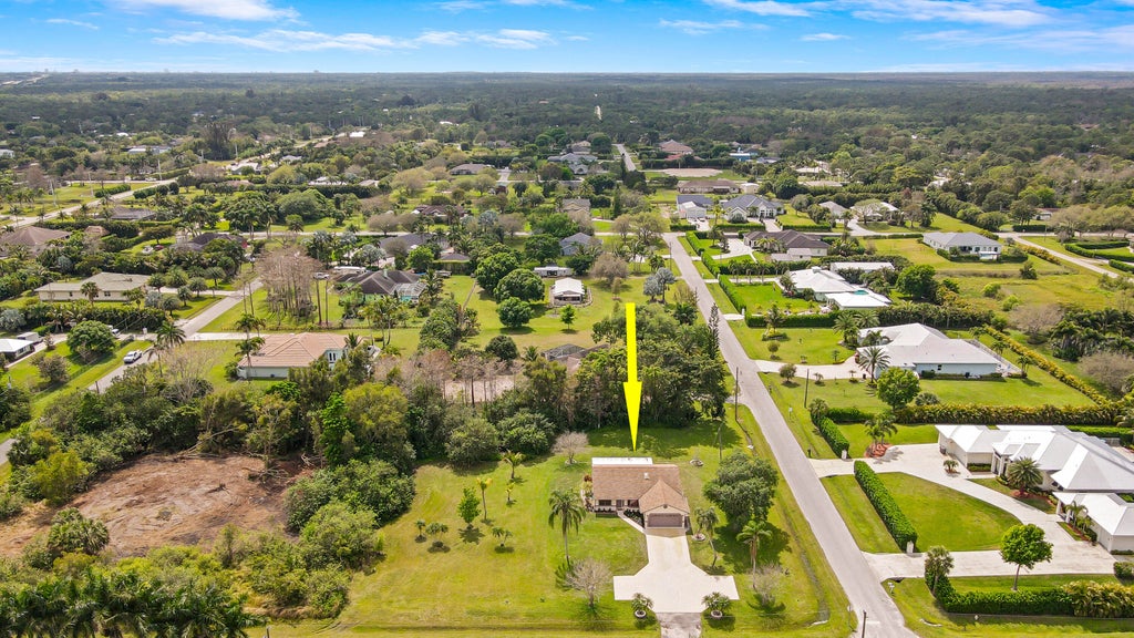Photo of 7662 165th Street N, Palm Beach Gardens, FL 33418 (MLS # R10968471)